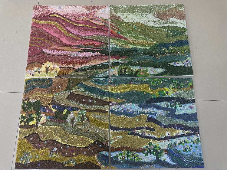 图为来自甘肃的牟小兰、陈雪、马玲珍、马晓轩、陈雪创作的藜麦画《布塄沟的美丽蝶变》。.jpg